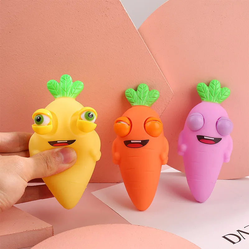 "Creative Cute Fruit Carrots: Silicon Eye-Popping Squeeze Toys for Kids - Stress-Relief Decompression and Explosive Fun"