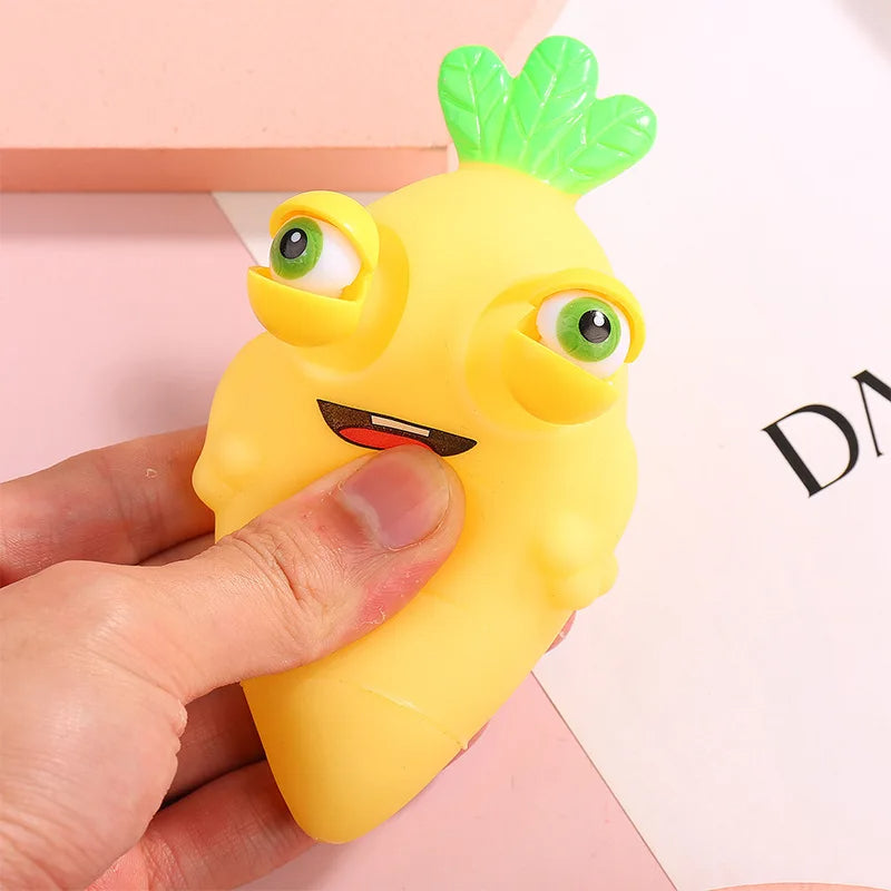 "Creative Cute Fruit Carrots: Silicon Eye-Popping Squeeze Toys for Kids - Stress-Relief Decompression and Explosive Fun"